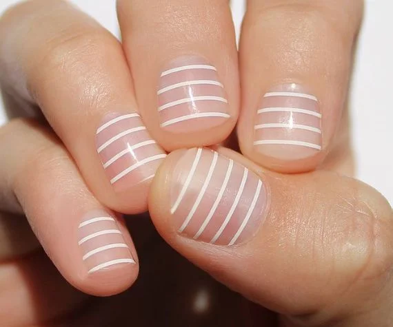 Unhas com listras finas